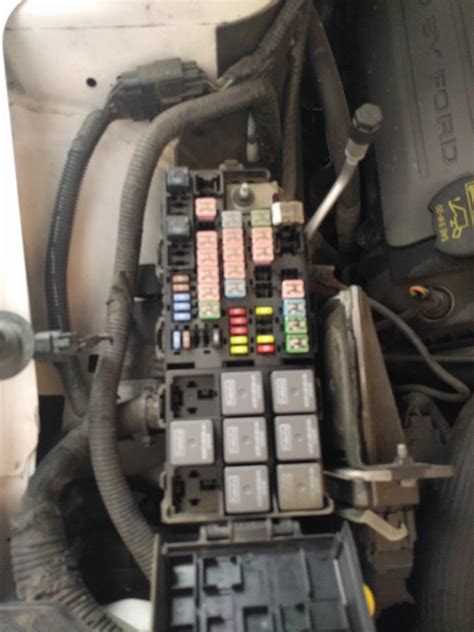 2014 ford fusion smart junction box location|Smart Junction Box: How to Remove SJB Fuse 15 for Reset .